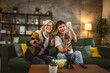© Miljan Živković - teenager male and his mother mature woman man play console video game