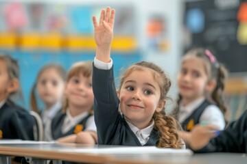 Wall Mural - A girl in a school uniform raises her hand in the air