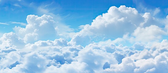 Wall Mural - the azure sky painted with fluffy white cumulus clouds creates a beautiful natural landscape. the el