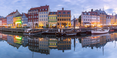 Wall Mural - Panorama of Nyhavn with colorful facades of old houses and ships in Old Town of Copenhagen, Denmark.