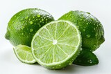 Fototapeta Przestrzenne - Realistic photograph of a complete Green lime with cut in half and slices