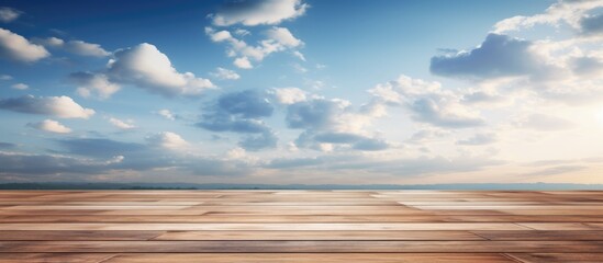 Wall Mural - a wooden table is set against a backdrop of a cloudy sky, creating a natural landscape with cumulus 