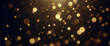Partículas de brillo dorado fondo abstracto.Bokeh de partículas de brillo de luz dorada de Navidad sobre fondo negro marino. Concepto de vacaciones. Fondo abstracto con partículas de oro.	