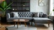 Round accent coffee table against gray tufted sofa. Minimalist loft home interior design of modern living room.