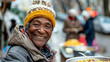 © Lyfrena - Joyous elderly black woman serving food, community help, warmth in smile, homeless charity.