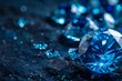 Blue gemstones on a dark background, sparkling