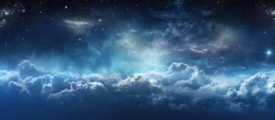Wall Mural - a natural landscape with a vibrant electric blue sky, adorned with fluffy cumulus clouds and twinkli