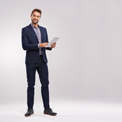 Fototapete - Businessman, smile and confident with tablet in studio on white background for startup company as salesman. Portrait, entrepreneur and happy to browse internet, website and network with mockup