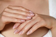 Beautiful Woman hand closeup. Manicure and Hands Spa. Manicured nails and Soft hands skin. Cosmetology, beauty. Skin care