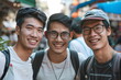Three chinese men standing on the street and smiling