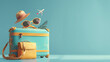 Suitcase with travel and vacation accessories on blue background, copy space. Space for advertising or text.