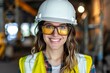 Female industrial worker woman wearing helmet