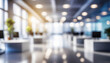 © Loliruri - Blurred empty open space office. Abstract light bokeh at office interior background for design