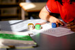 © Austockphoto - Closeup of dice and maths sheets