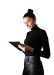 © Who is Danny - A smiling woman in a black turtleneck using a digital tablet, isolated on a white background, depicting modern technology use