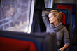 © Y.A./peopleimages.com - Woman, travel and smile on train to think for business trip, work and conference for network in France. Female person, commute and journey on public transport with vision for convention and growth