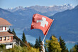 Swiss Flag Flying over Interlaken, Switzerland in Early Autumn