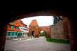 Widok z bramy na gotycką wieżę zamku krzyżackiego, Toruń, Poland