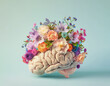 © Sabineyro - human brain with spring flowers, mental health concept
