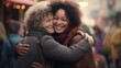 International Hug Day brings strangers together: an adult woman and a woman laugh and hug warmly on the street.