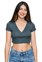 Poster - Young beautiful teen girl wearing casual crop top t shirt with a happy and cool smile on face. lucky person.