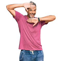 Canvas Print - Middle age grey-haired man wearing casual clothes smiling cheerful playing peek a boo with hands showing face. surprised and exited