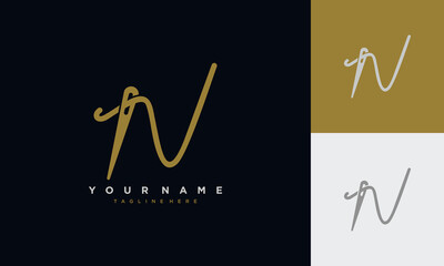 Fototapete - Initial letter n sewing logo formed from thread and needle with gold colour