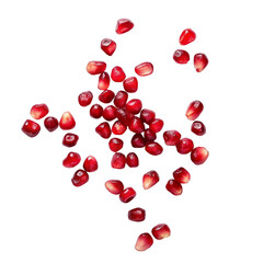 Falling pomegranate seeds isolated on transparent background. Top view.