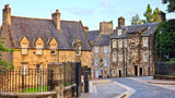Fototapeta Uliczki - Beautiful old stone houses in the historic old town of Sterling, Scotland, UK at sunset