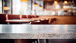 © xamtiw - Empty marble table, blurred restaurant background with copy space