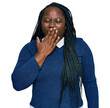 © Krakenimages.com - Young black woman with braids wearing casual clothes bored yawning tired covering mouth with hand. restless and sleepiness.