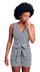 Wall Mural - Young african american woman wearing casual clothes feeling unwell and coughing as symptom for cold or bronchitis. health care concept.