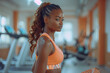 Beautiful fit athlete black African American woman in sportwear doing sport exercises at gym fitness twith sweaty face. Sports training equipment workout, AI
