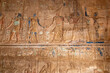 Remnants of Painted Ceremonial Carvings of Pharaohs on the Walls of the Karnak Temple Complex, Luxor, Egypt