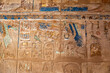 Remnants of Brilliantly Painted Blue Ceremonial Hieroglyphs and Carvings of Pharaohs on the Walls of the Karnak Temple Complex, Luxor, Egypt