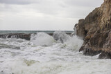 Fototapeta Big Ben - waves crashing against the rocks by the sea