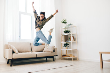 Poster - Joyful Woman Dancing and Singing with Music on Mobile Phone in Relaxing Home Interior