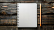Notebook and pencil on wooden background. Top view with copy space