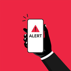 Hand holds phone with alert notification, scam and cyber security