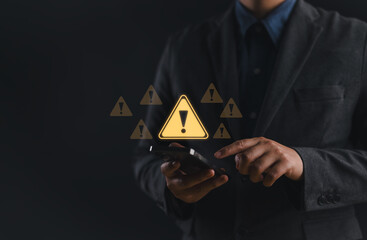 Fototapete - System hacked warning alert. Businessman use smartphone with warning sign for cyber attack. Ransomware, Virus, Spyware, Malware or Malicious software, Data breach, Cyber security and cybercrime.