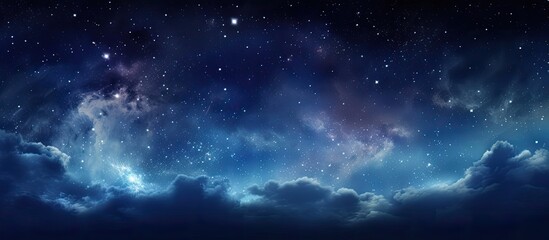 Wall Mural - The night sky is a canvas filled with twinkling stars and fluffy clouds. The electric blue atmosphere provides a stunning backdrop for astronomical objects in space