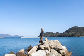 Wall Mural - 海街を旅する女性