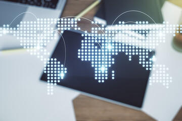 Poster - Abstract creative world map with connections and modern digital tablet on background, top view, international trading concept. Multiexposure