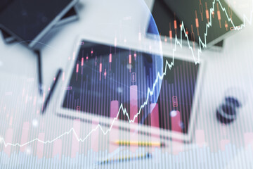 Poster - Multi exposure of abstract creative financial graph with world map and modern digital tablet on background, top view, forex and investment concept