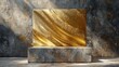 a gold square sculpture sitting on top of a marble block in front of a wall with a shadow cast on it.