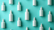 Blank skincare product bottles against a vibrant turquoise background
