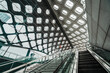 Futuristic Escalator in Modern Architectural Setting