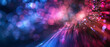 A colorful, blurry image of a light show with purple and blue hues