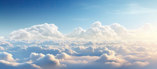 Wall Mural - A commercial aircraft is soaring at a great altitude amidst the vast blue sky