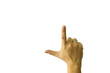 A male hand with the index finger extended, pointing toward a specific object or direction, indicating focus or significance